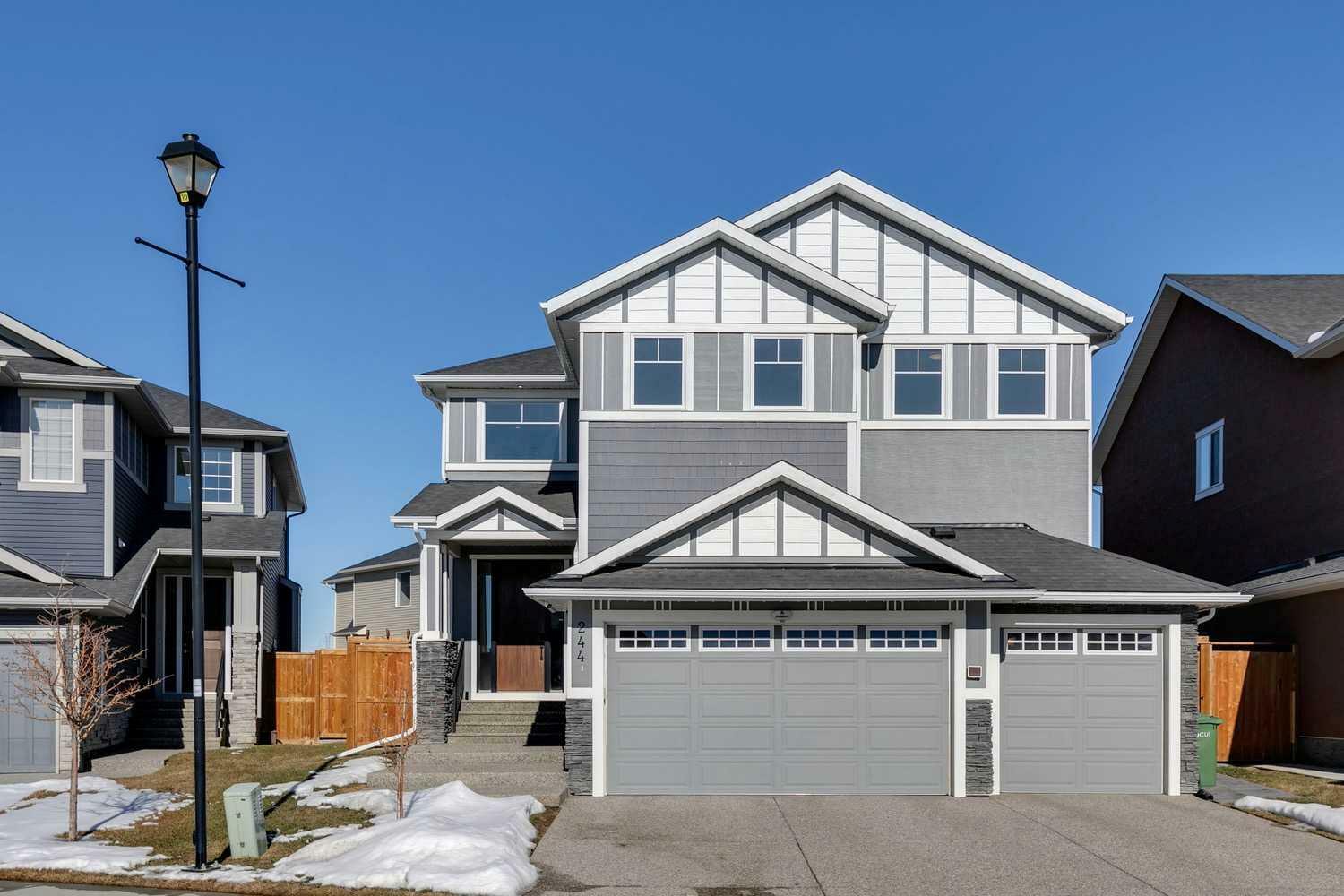 Property Photo: 244 Aspenmere Way AB T1X 0Y2