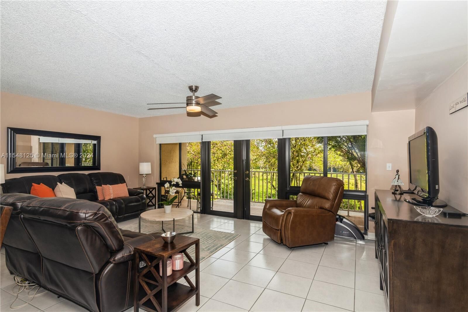 Property Photo:  9937 NW 9th St Cir 5-19  FL 33172 
