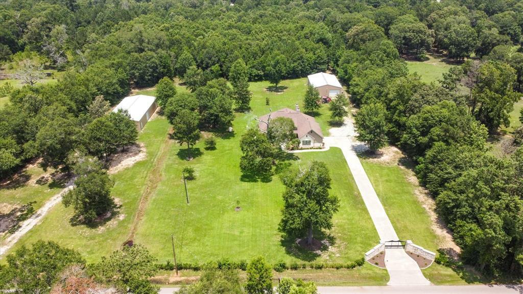 Property Photo: 1705 County Road 318 TX 77327