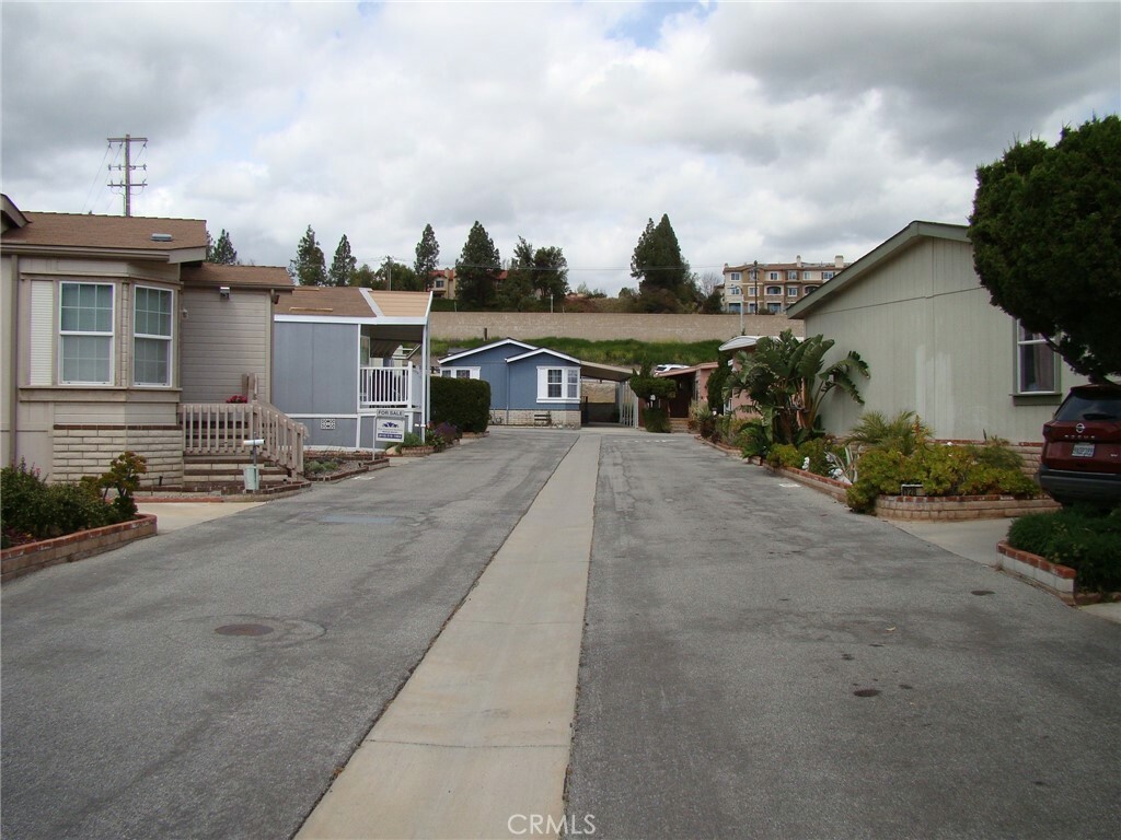 Property Photo:  11401 Topanga Canyon Blvd. 128  CA 91311 