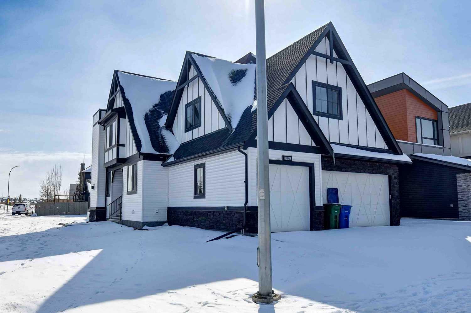 Property Photo:  1209 Coopers Drive SW  AB T4B 0G7 
