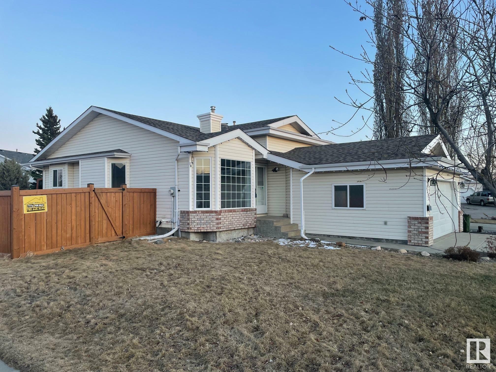 Property Photo:  5303 154A Avenue NW  AB T5Y 2S5 