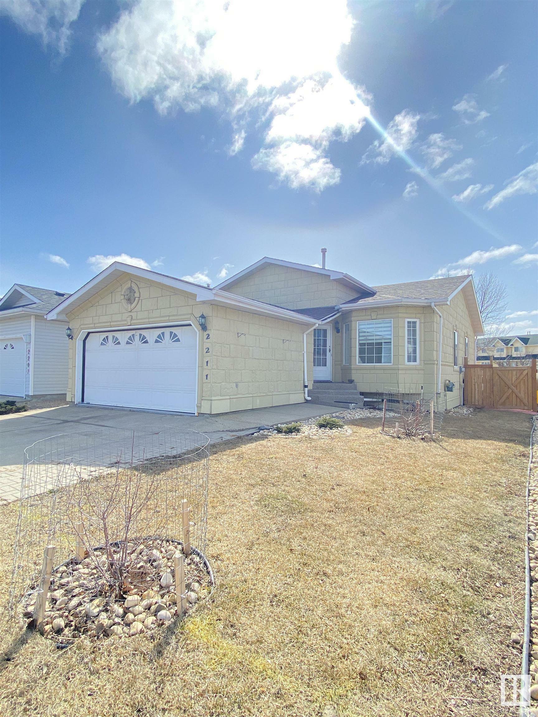 Property Photo:  2211 133 Avenue NW  AB T5A 4Z9 