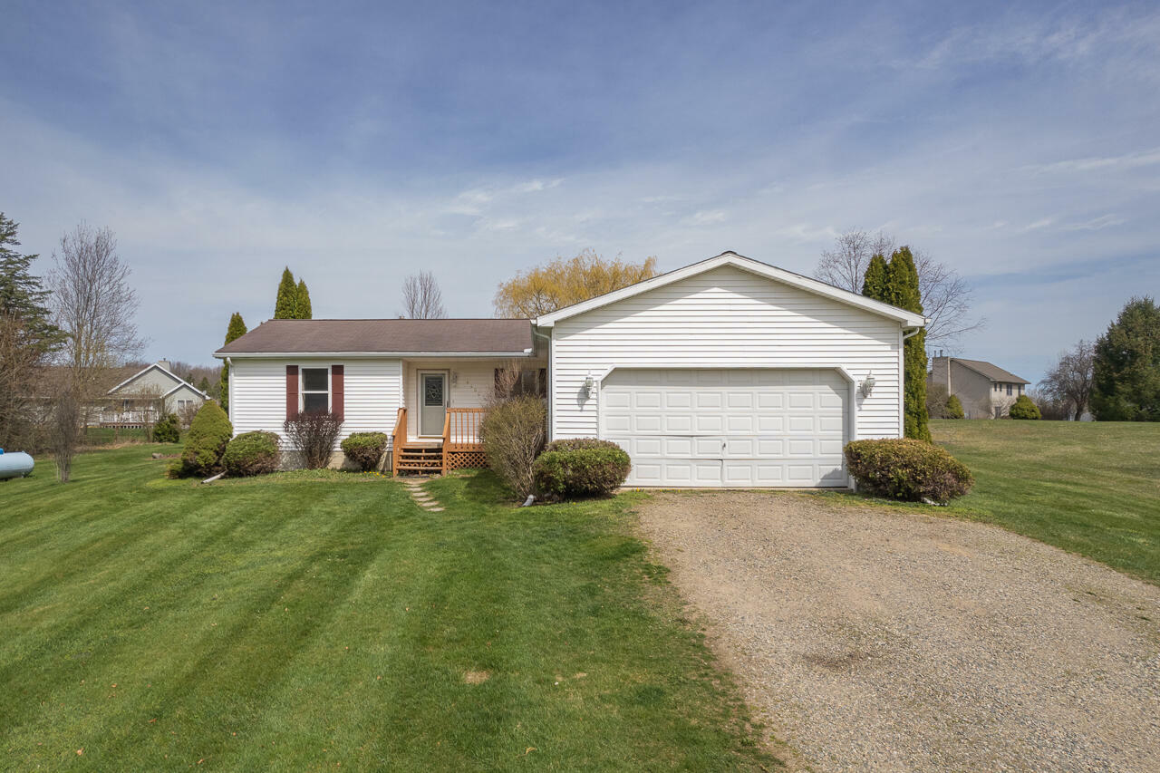 Property Photo:  4400 Coonhill Road  MI 49272 