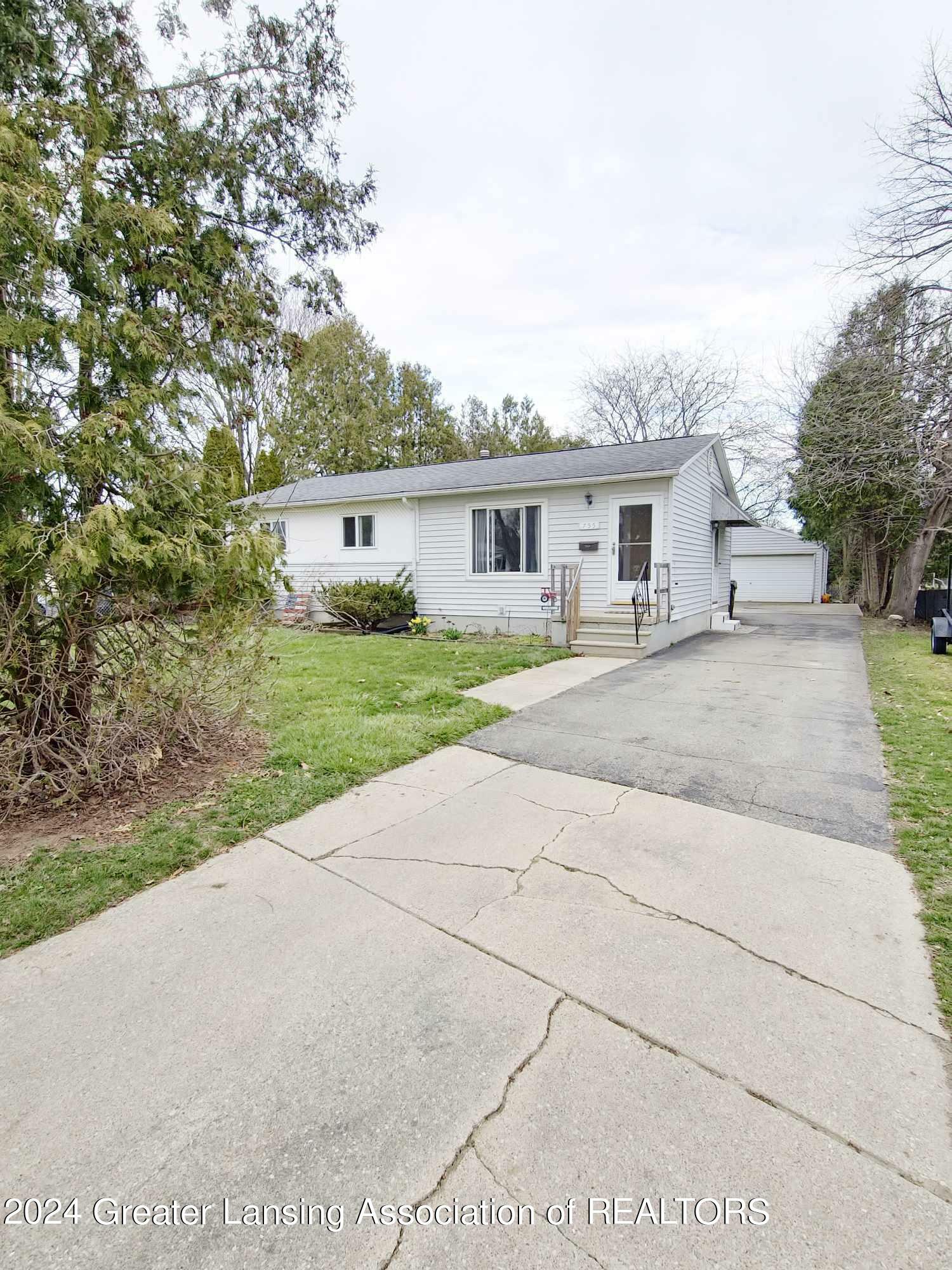 Property Photo:  755 Coventry Street  MI 48867 