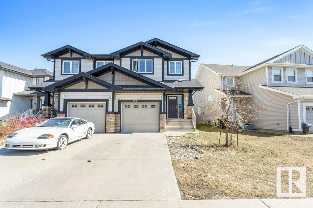 Property Photo:  9911 217 Street NW  AB T5T 4T7 