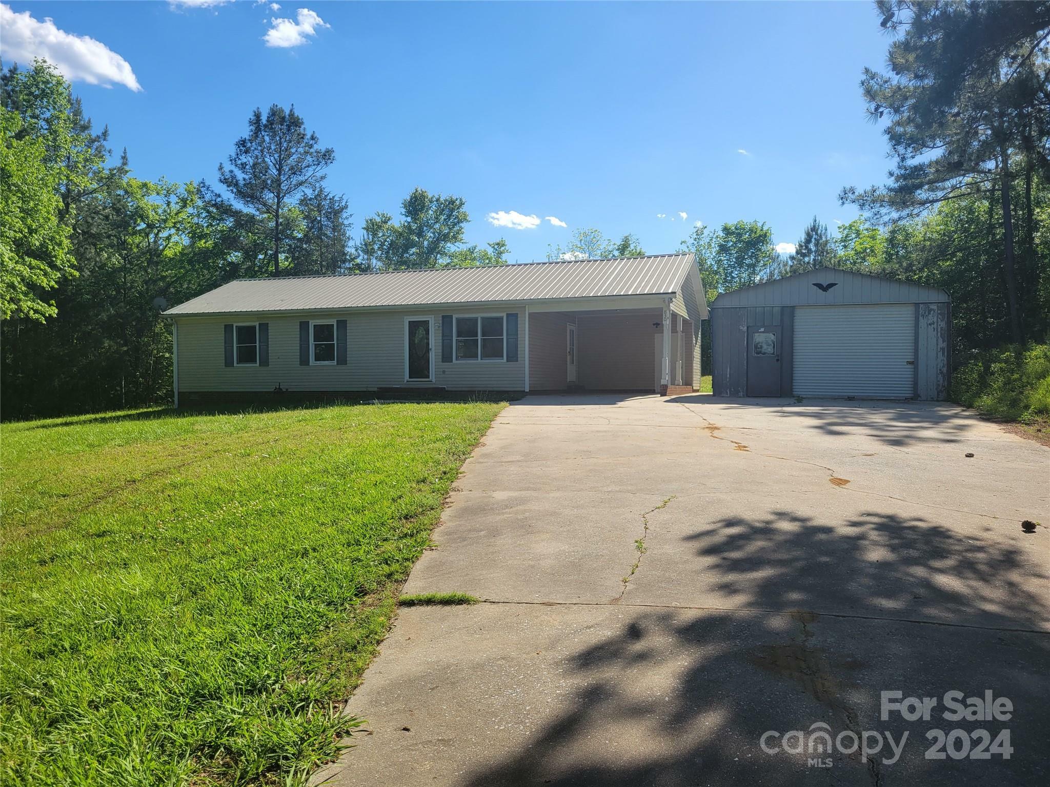 Property Photo:  830 Long Branch Road  NC 28073 