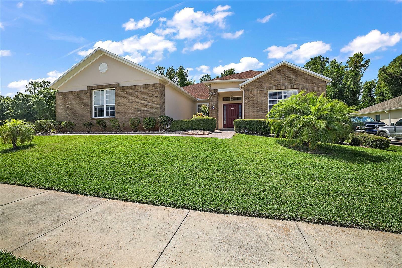 Property Photo:  5614 Windsong Oak Drive  FL 34748 