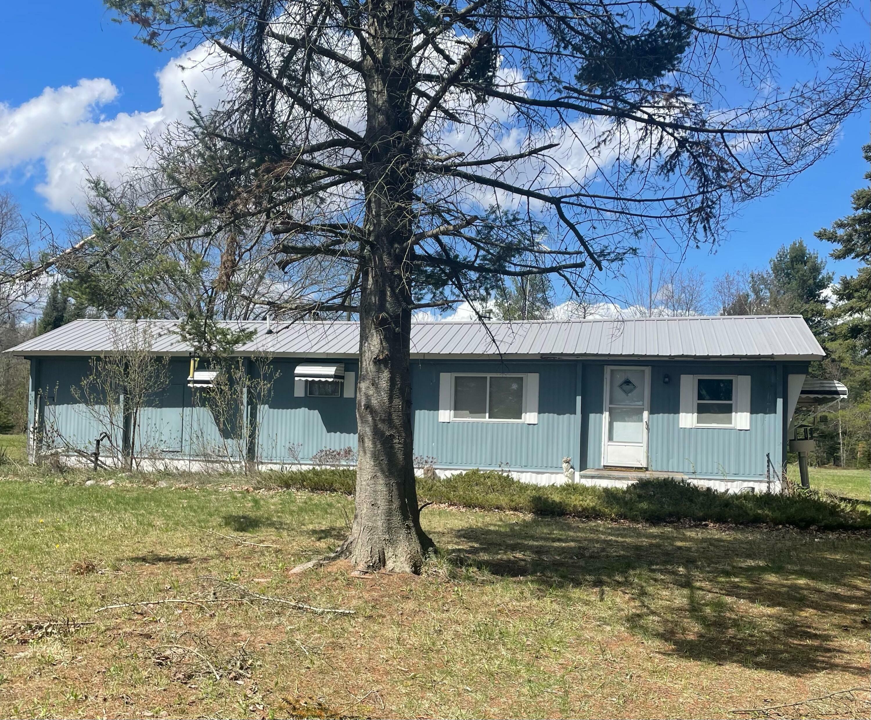 Property Photo:  13450 Airport Road  MI 49709 