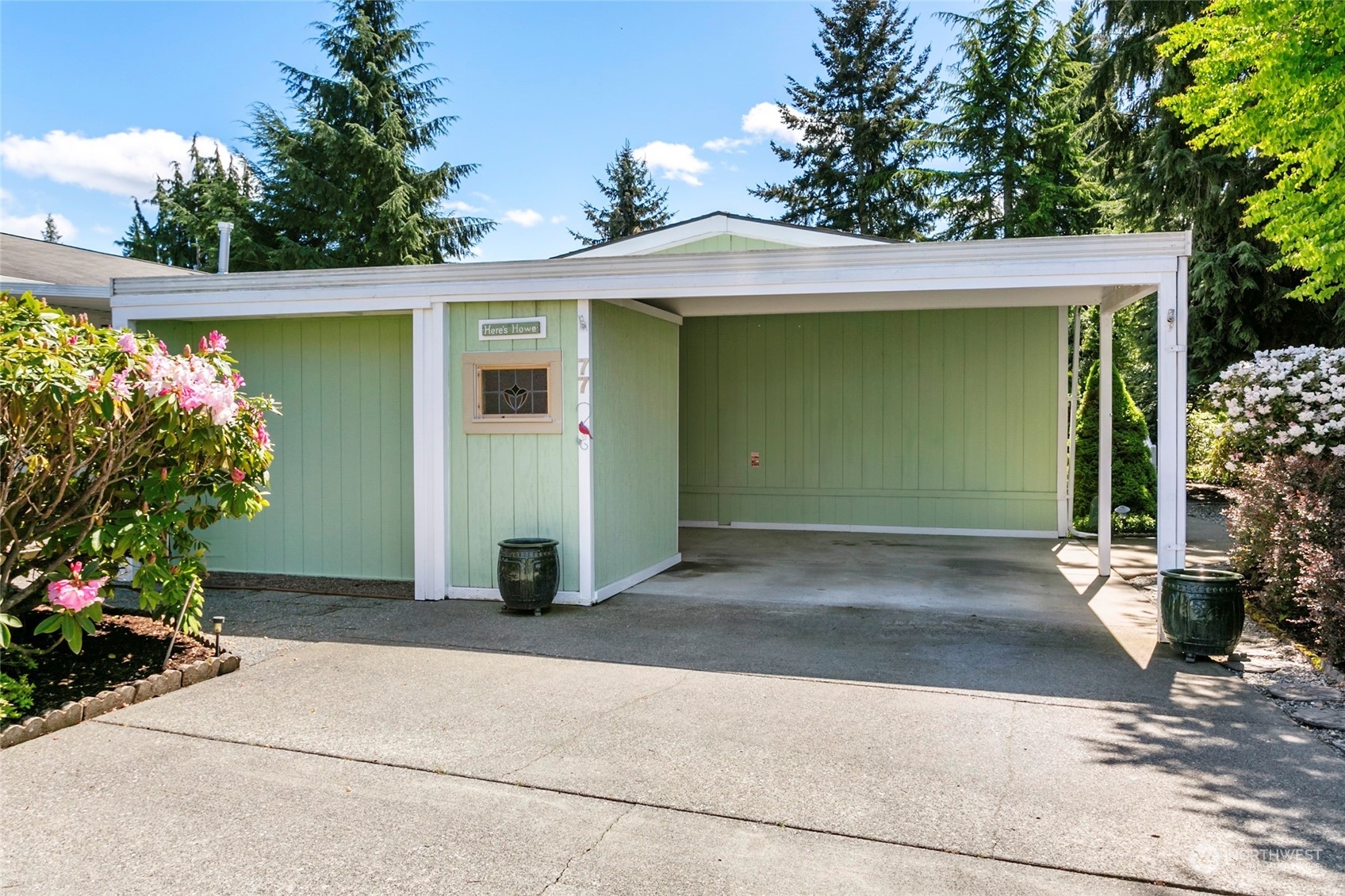 Property Photo:  8430 SE 15th Place 77  WA 98258 