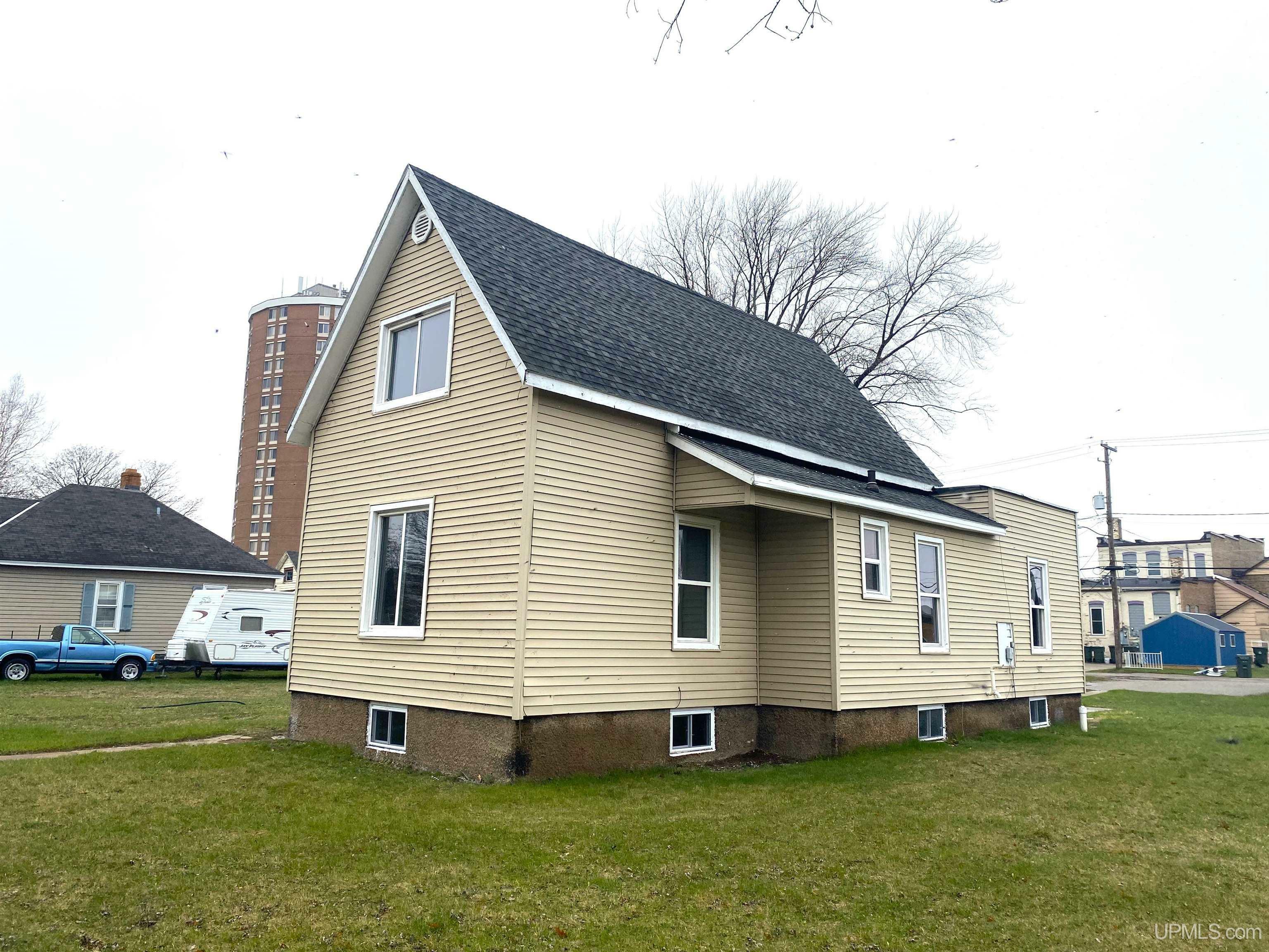 Property Photo:  412 1st Ave S Avenue  MI 49829 