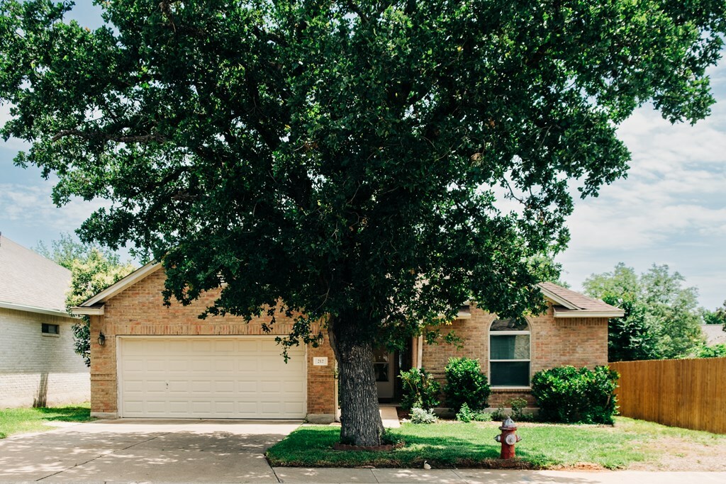 Property Photo:  212 Peach Tree  TX 78624 