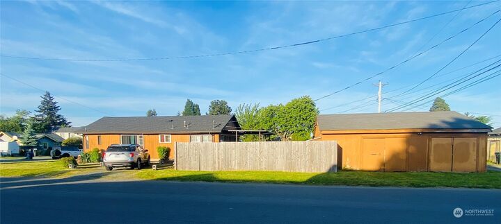 Property Photo:  902 E 61st Street  WA 98404 