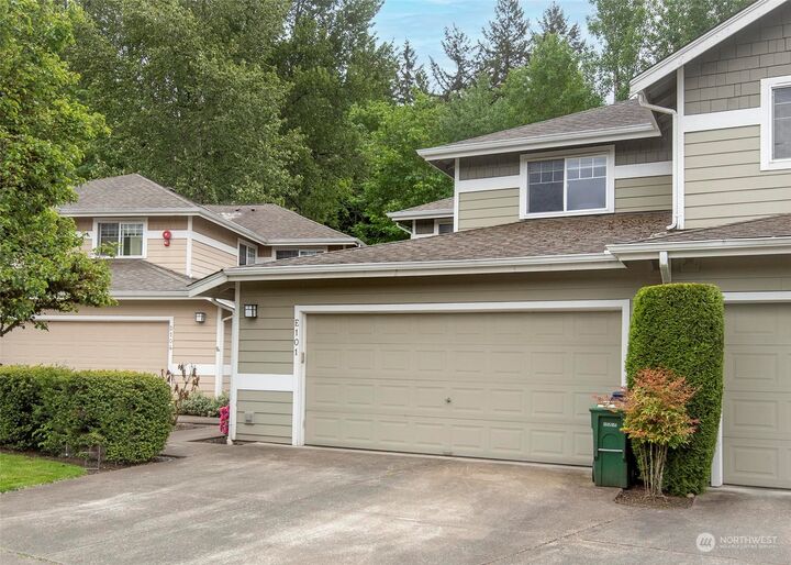 Property Photo:  15150 140th Way SE E101  WA 98058 