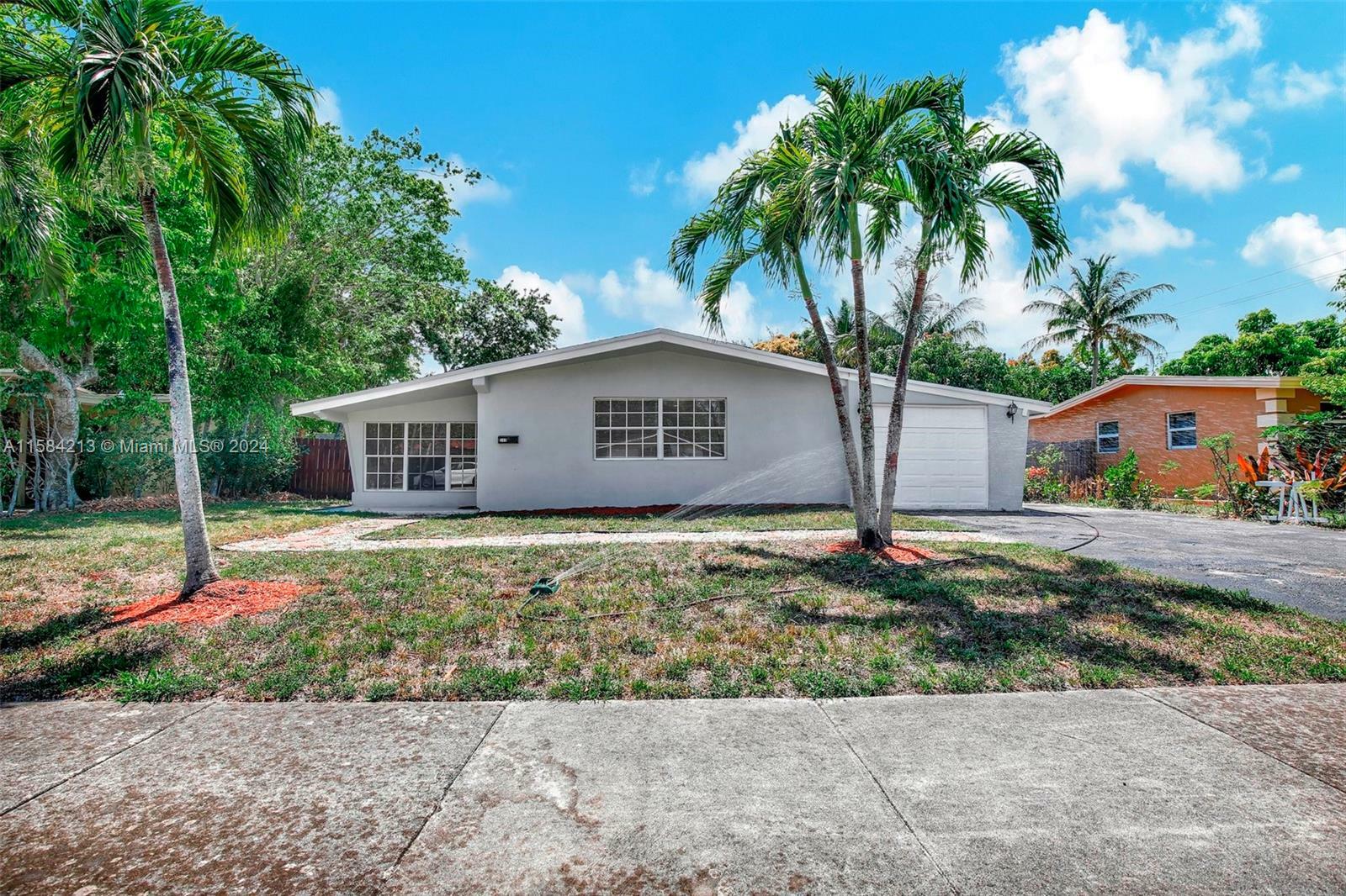 Property Photo:  309 NW 44th Ave  FL 33317 