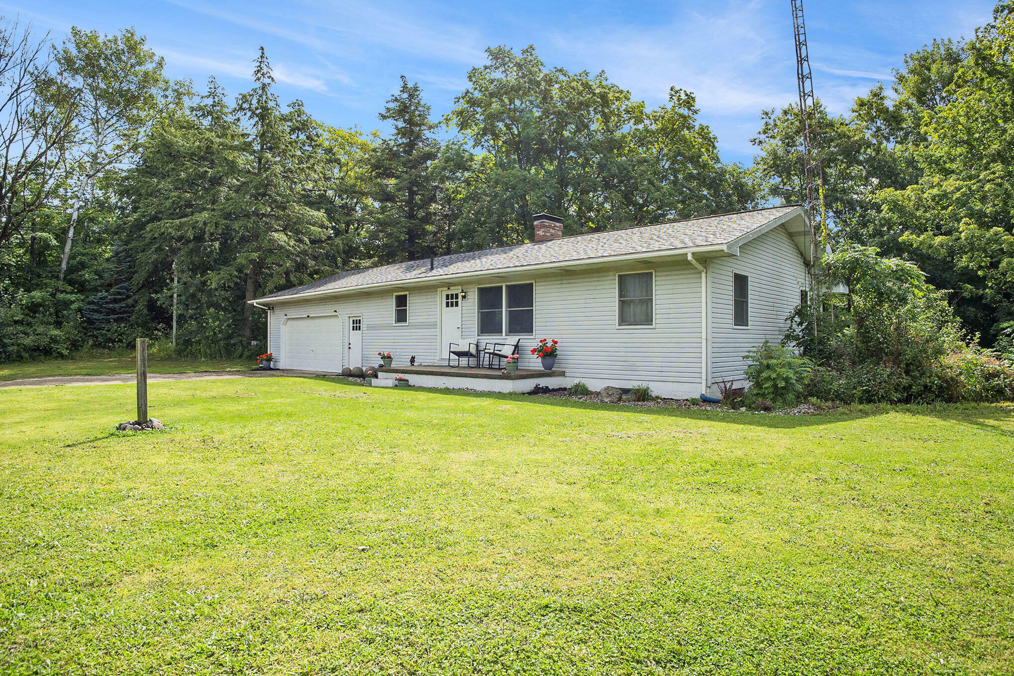 Property Photo:  5959 W Wilke Road  MI 49437 