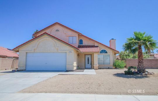 Property Photo:  213 W Kendall Ave  CA 93555 