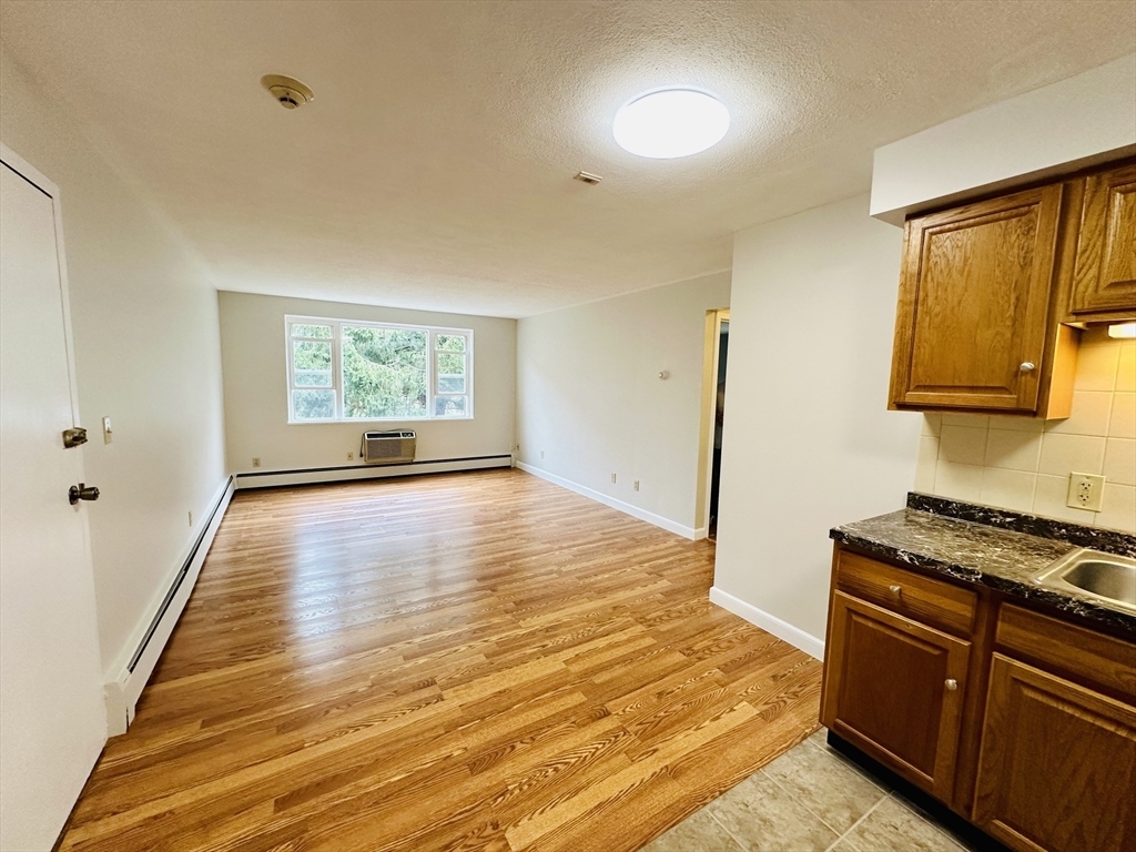 Property Photo:  1105 Lexington Street 8-4  MA 02452 