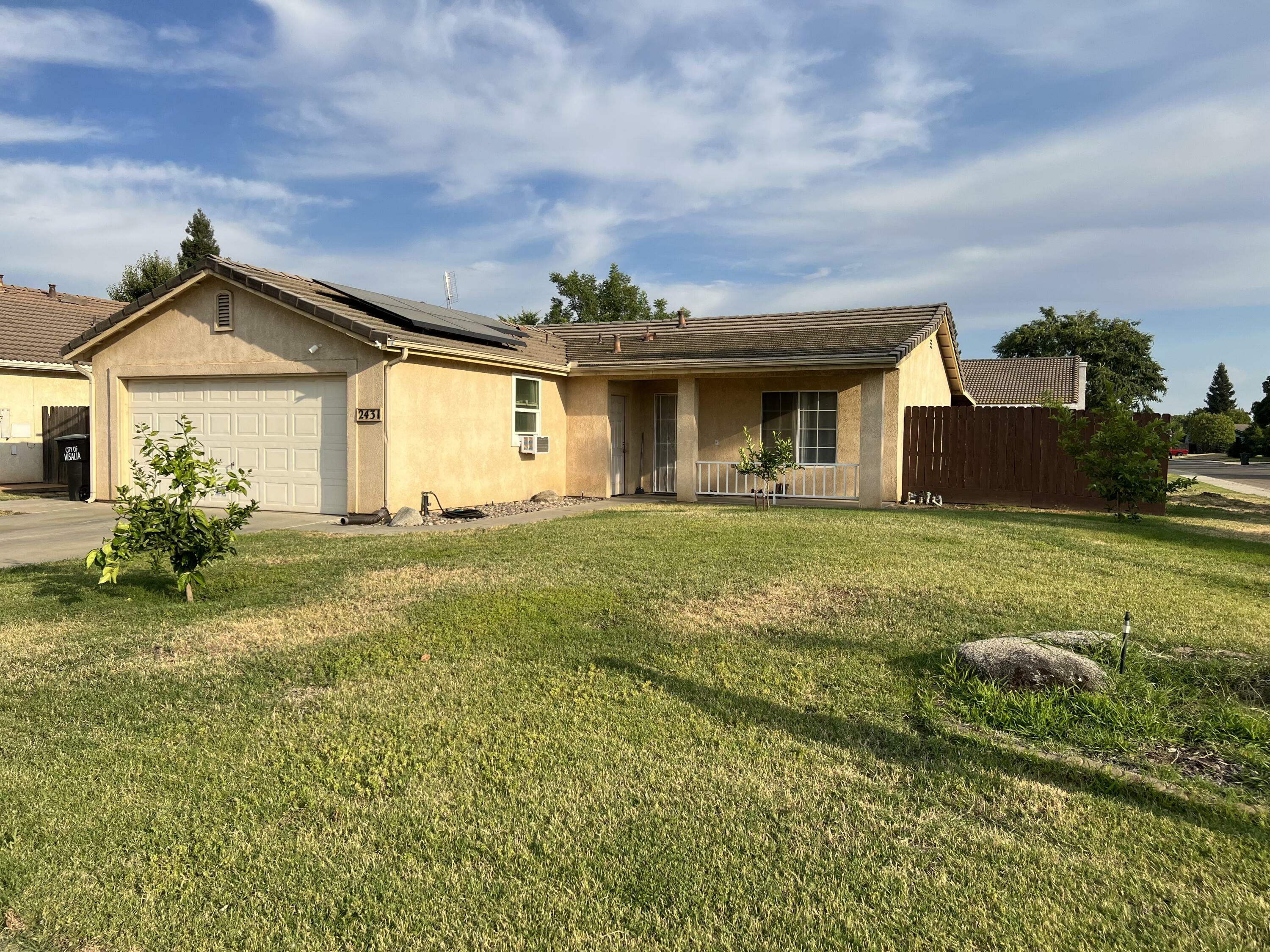 Property Photo:  2431 W Clinton Avenue  CA 93291 