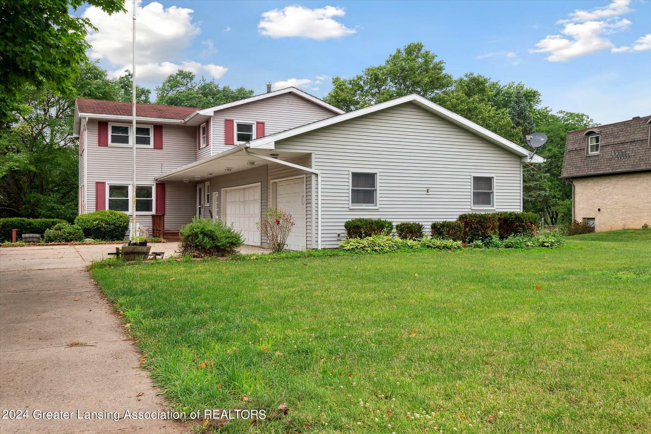 Property Photo:  6745 Lansdown Drive  MI 48821 