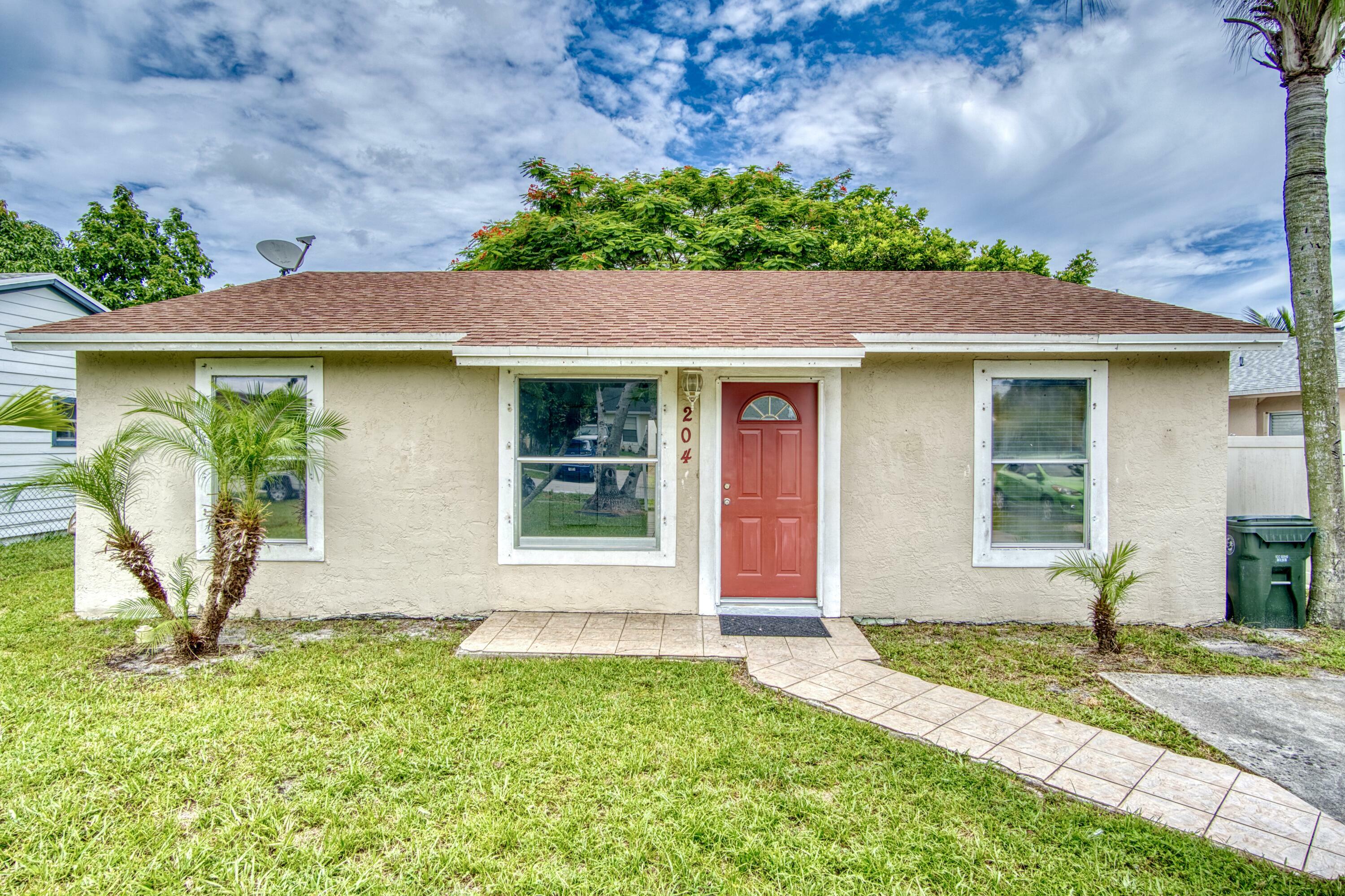 Property Photo:  204 Martin Avenue  FL 33463 