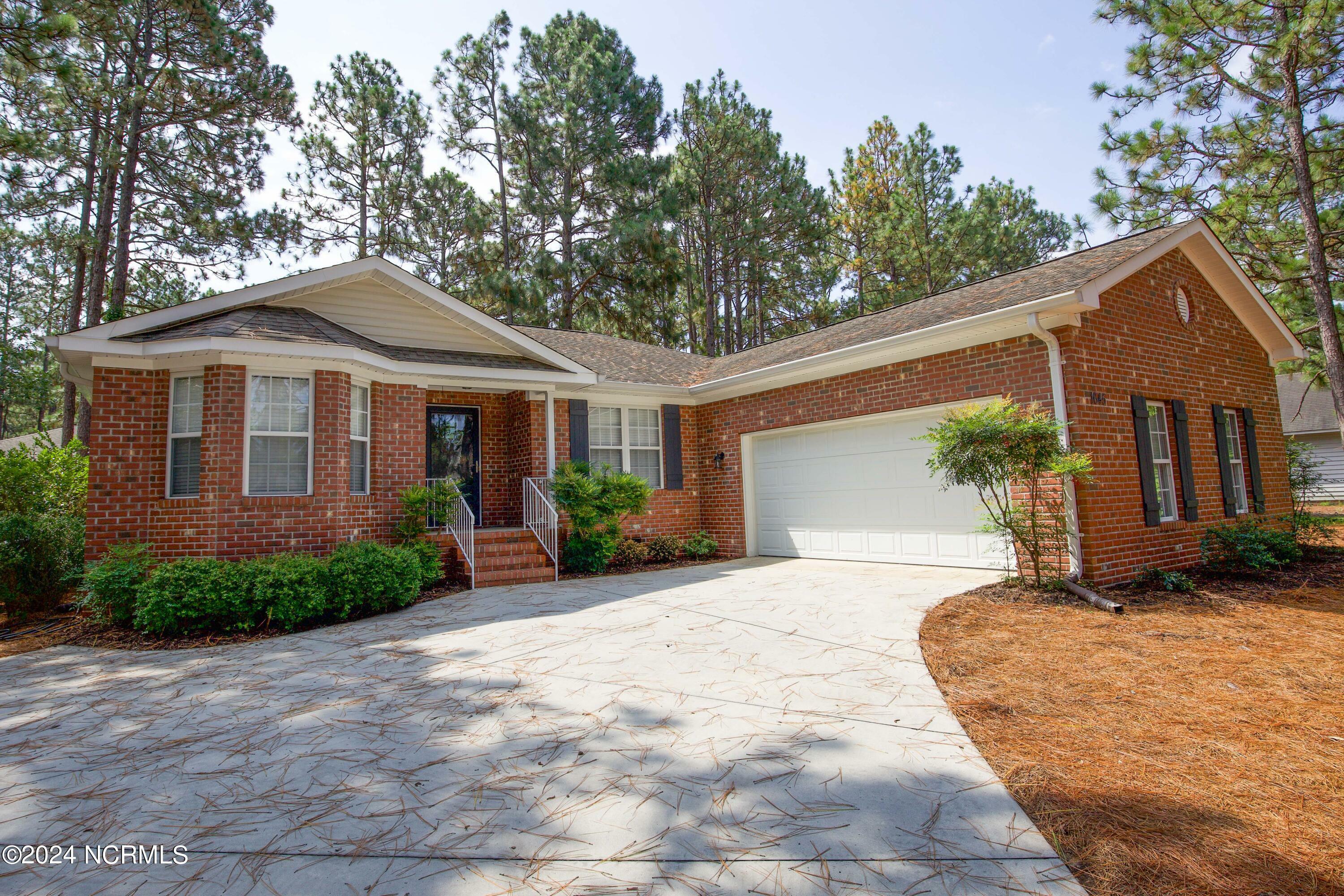 Property Photo:  1645 Longleaf Drive E  NC 28374 