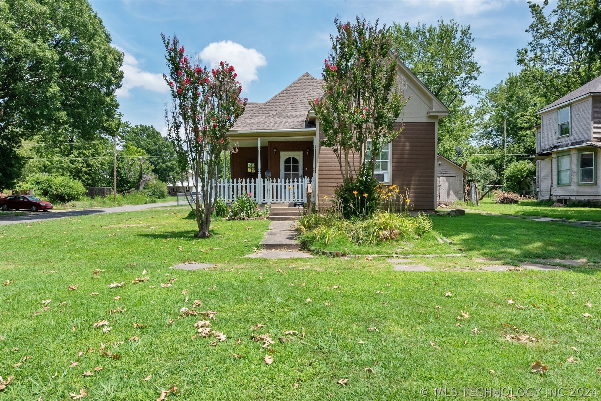 Property Photo:  1228 Locust Street  OK 74403 