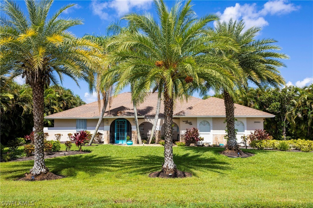 Property Photo:  18001 Royal Tree Parkway  FL 34114 