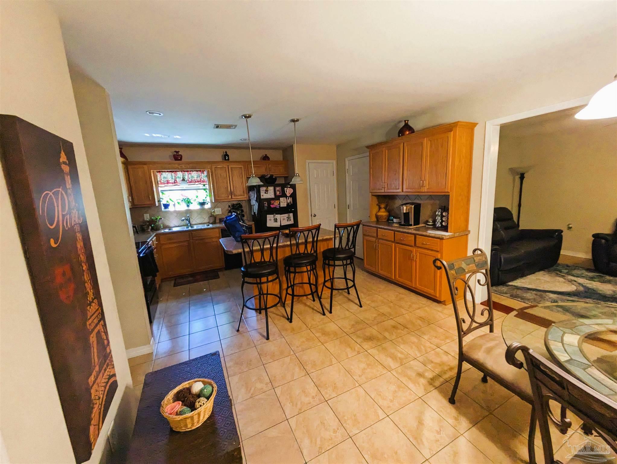 Property Photo:  7045 Santa Barbara St  FL 32526 