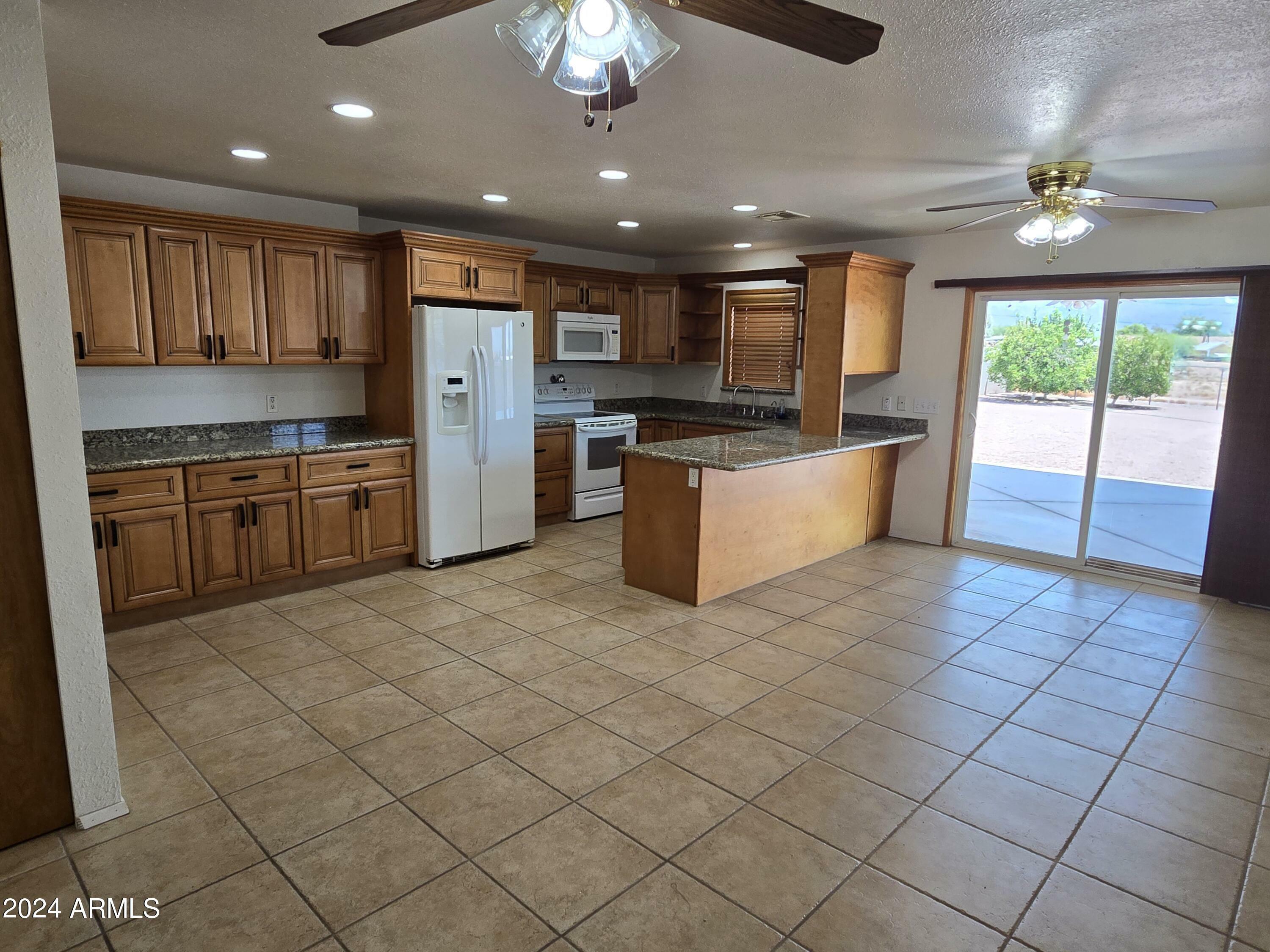 Property Photo:  2243 S Cactus Road  AZ 85119 