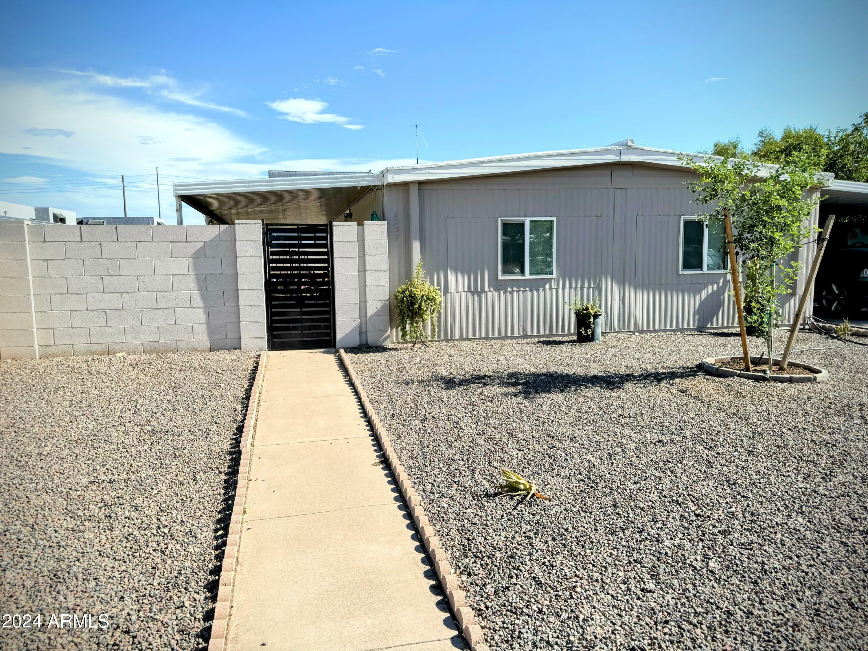 Property Photo:  6527 W Eva Street  AZ 85302 