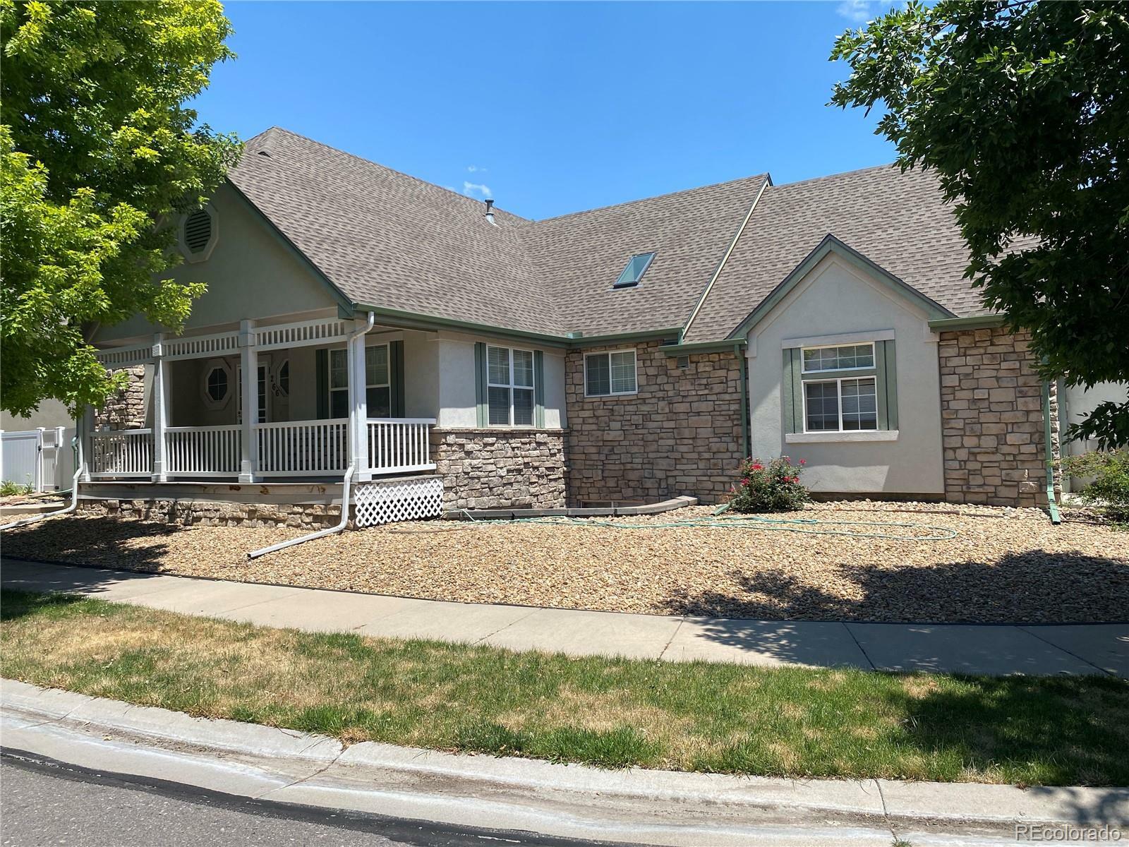 Property Photo: 1266 S Ammons Street CO 80232
