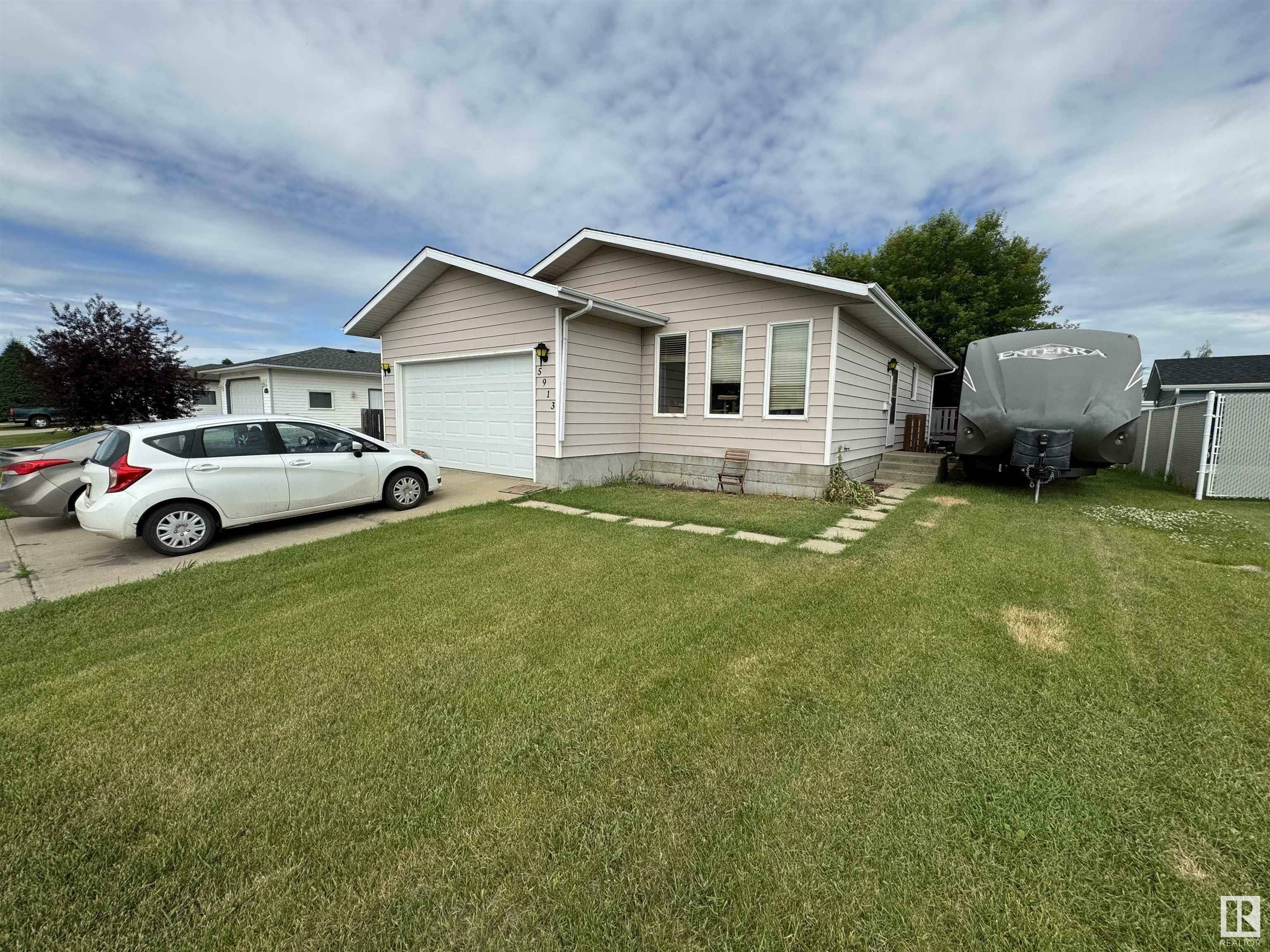 Property Photo:  5913 53 Street  AB T9C 1J3 