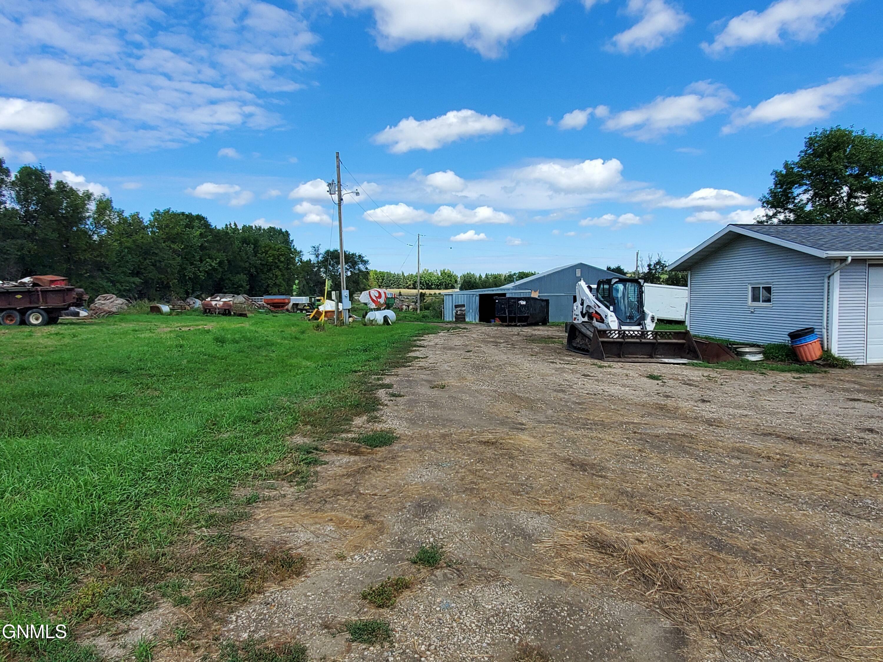 Property Photo:  8600 97 Avenue NE  ND 58503 