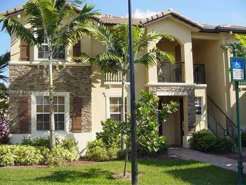 Property Photo:  3350 NE 13th Cir Dr 104-21  FL 33033 