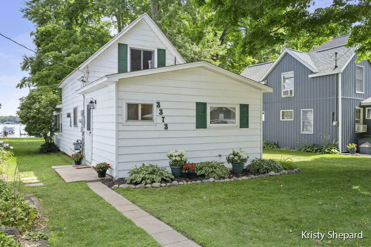 Property Photo:  3373 Sandy Beach Street  MI 49348 