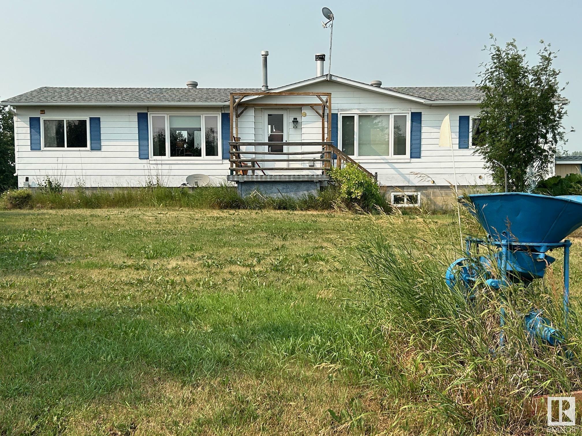 Property Photo:  59307 Hwy 63  AB T0A 3J0 