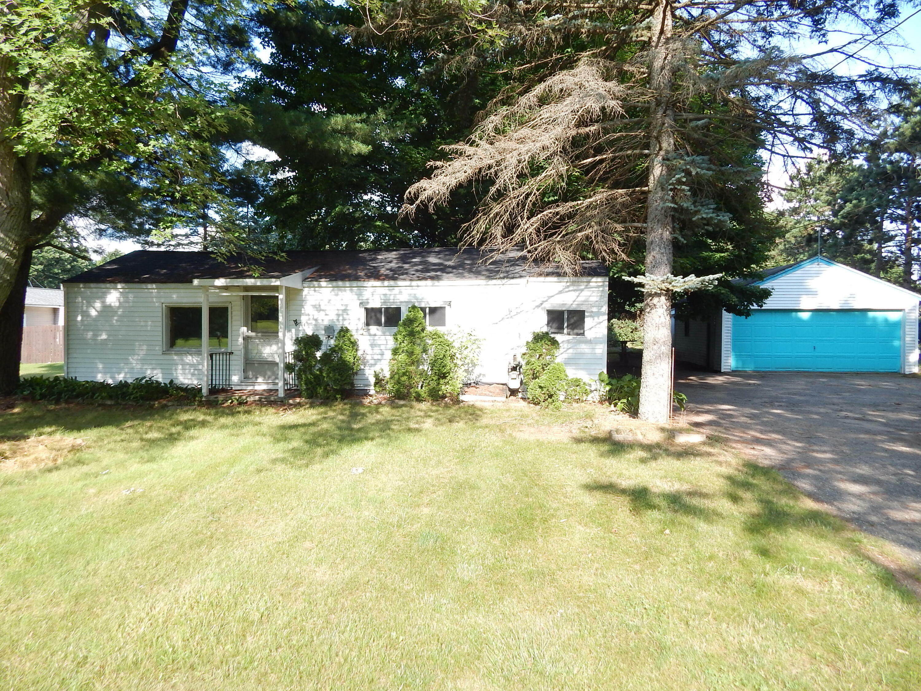 Property Photo:  9314 Alpine Avenue NW  MI 49345 