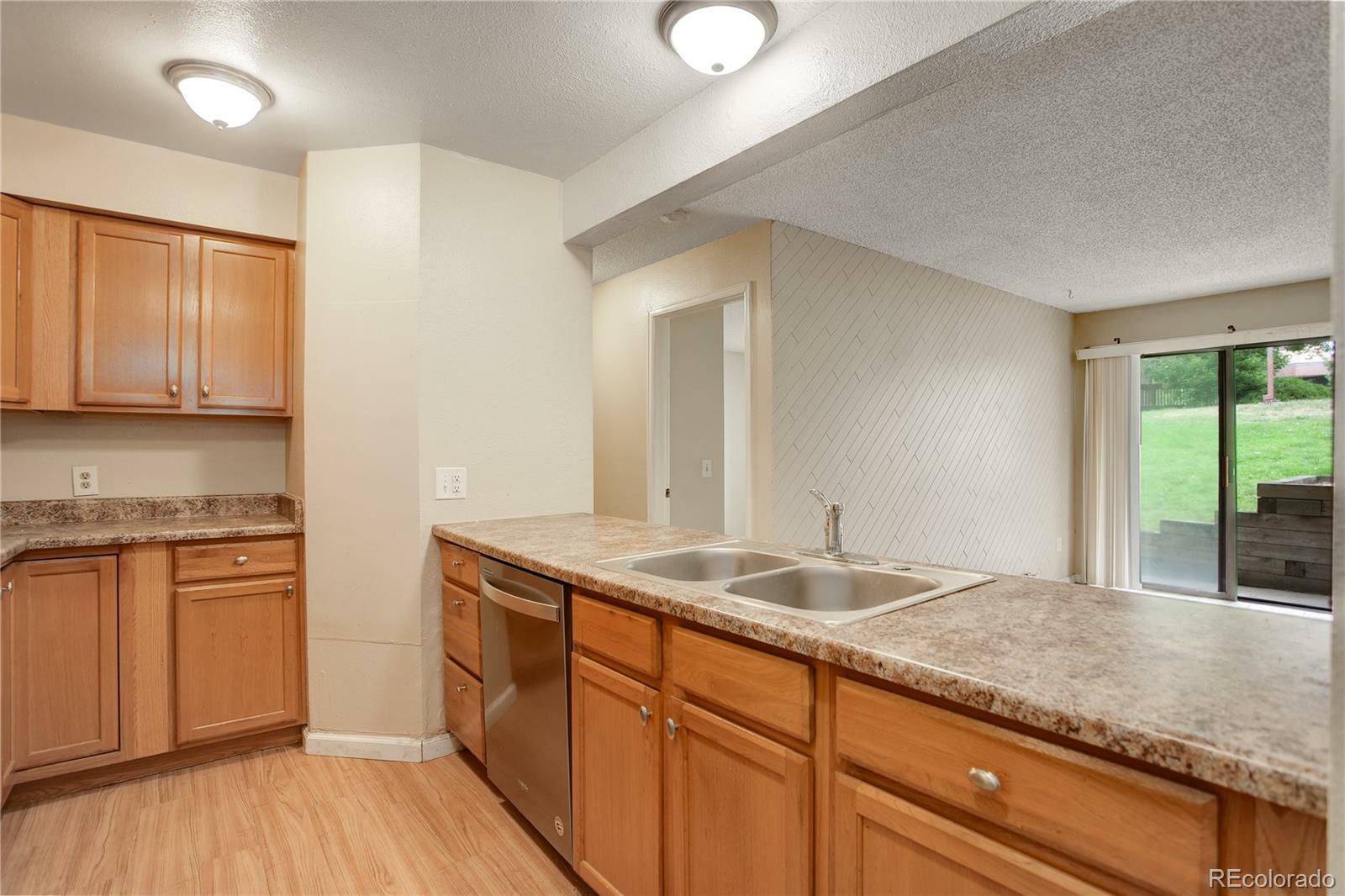 Property Photo:  14652 E 2nd Avenue 103D  CO 80011 