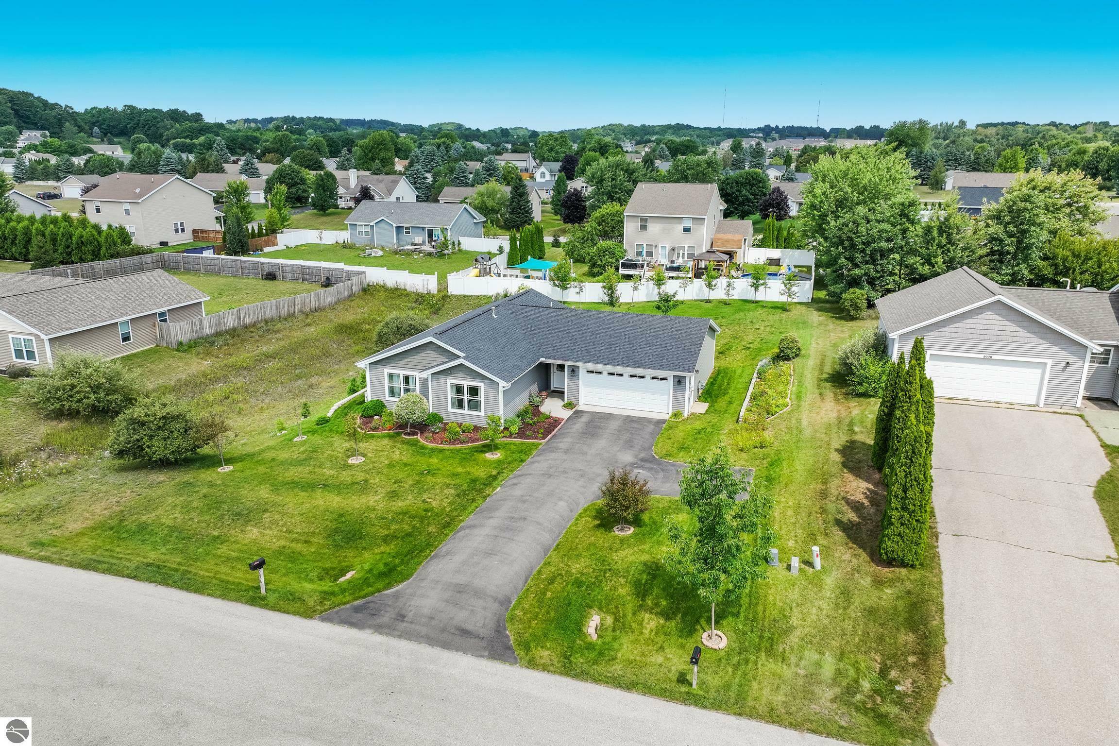 Property Photo:  5086 Liberty Drive  MI 49685 