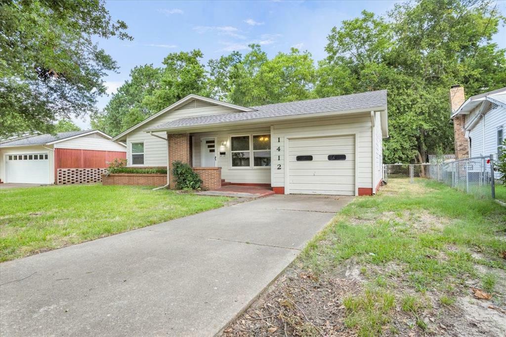 Property Photo: 1412 N Wharton Street TX 75092