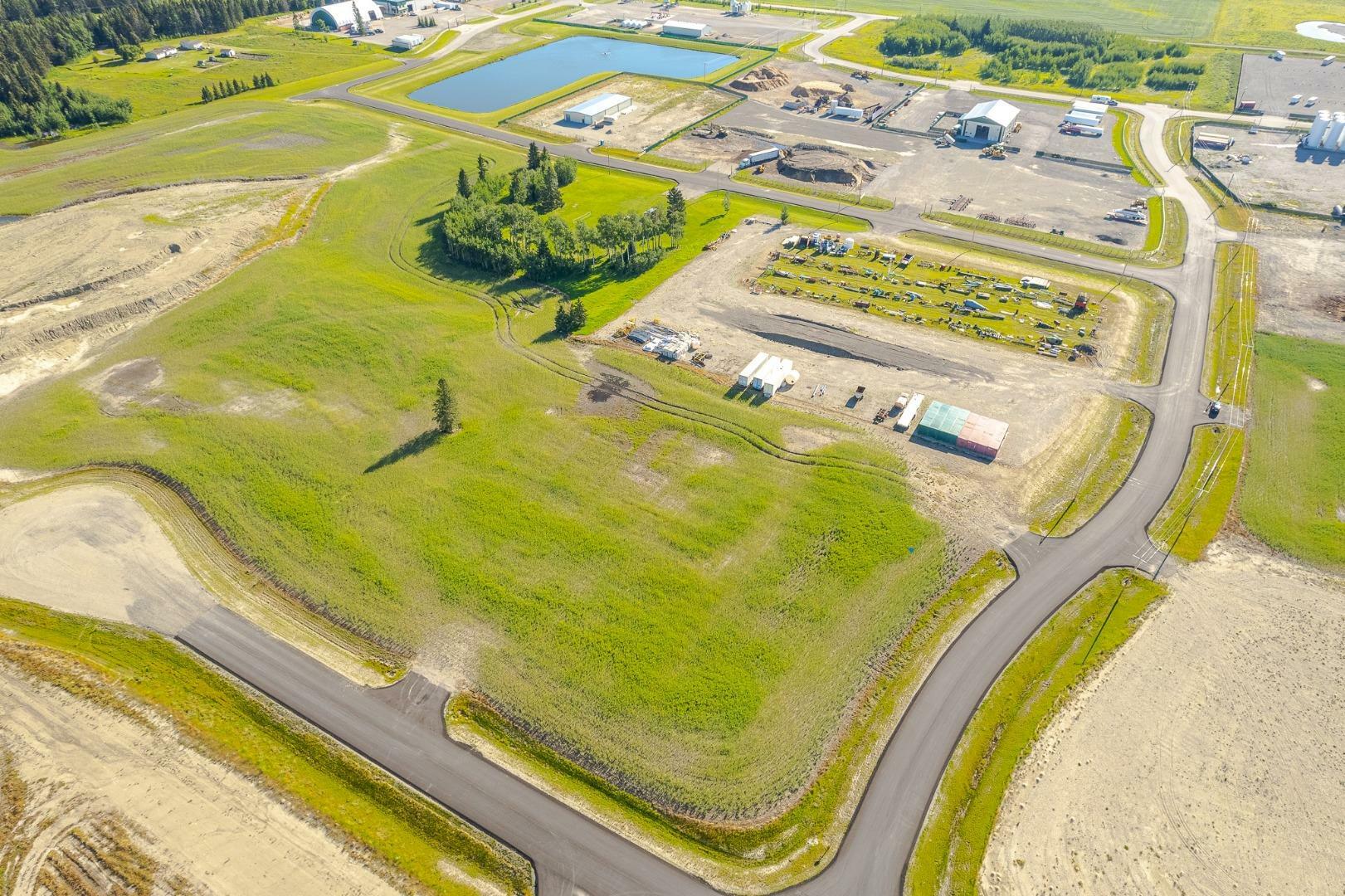 Property Photo:  #120-32532 Rr42  AB T0M 1X0 