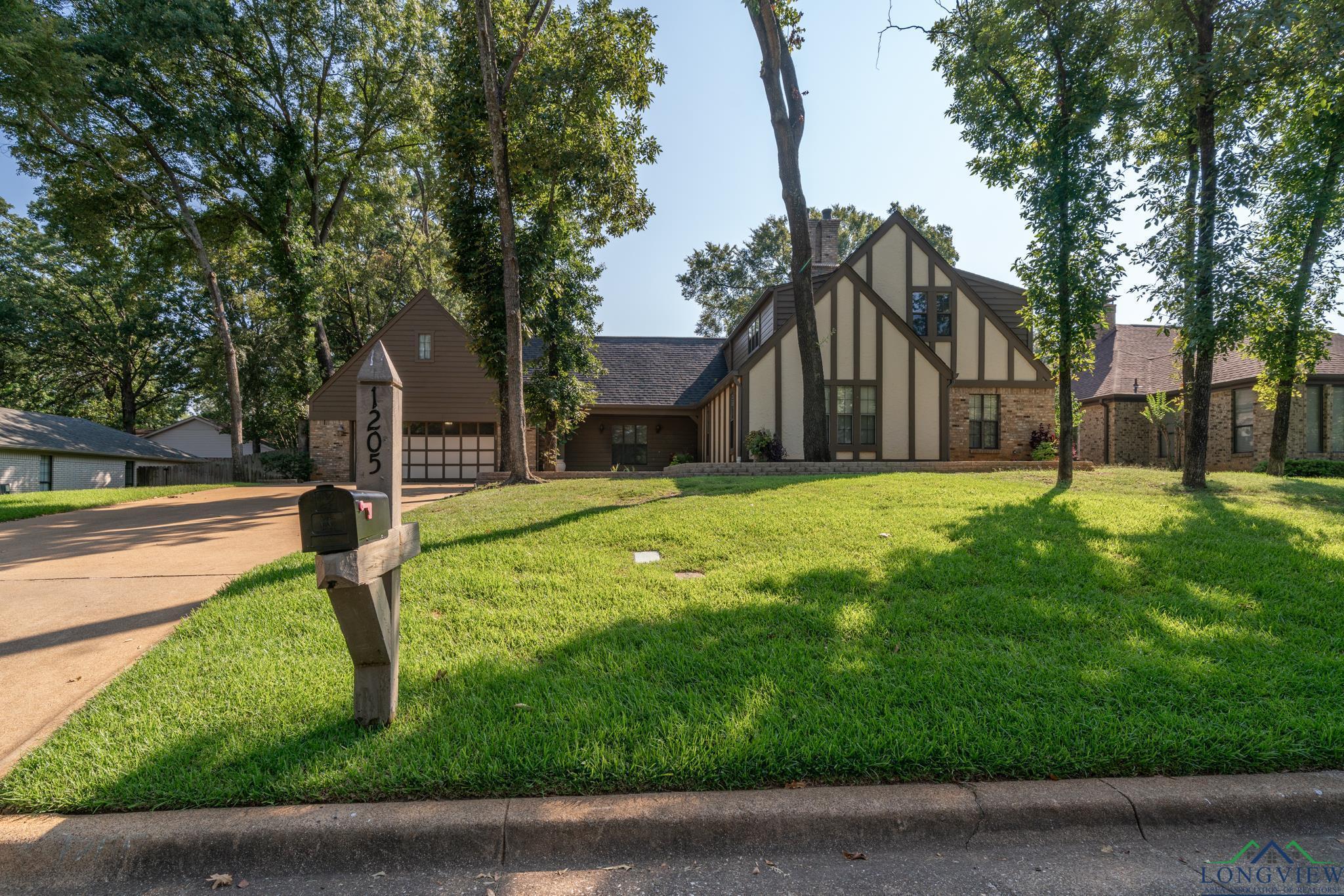 Property Photo: 1205 Windsong Ln TX 75604