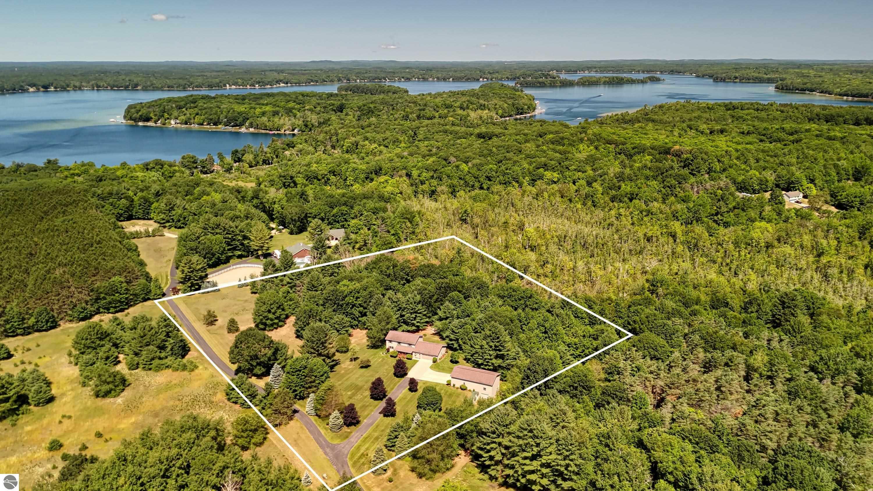 Property Photo:  1025 Bass Lake Road  MI 49685 