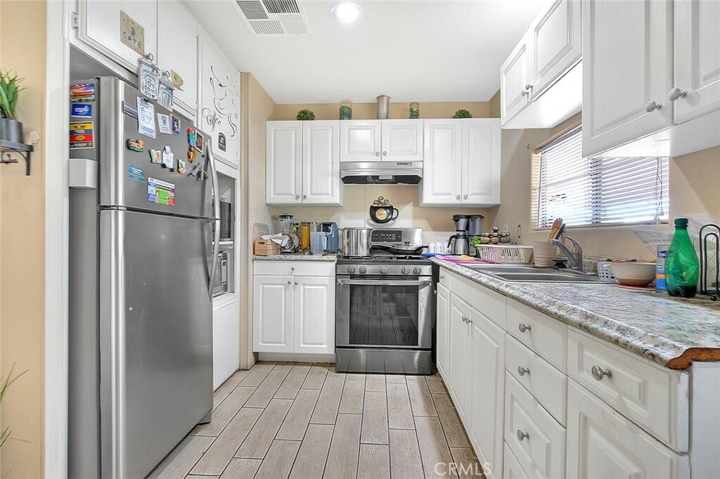 Property Photo:  2930 W Rialto Ave 29  CA 92376 