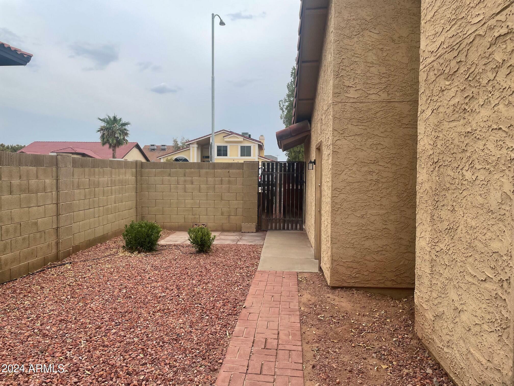 Property Photo:  7720 W Cholla Street  AZ 85345 