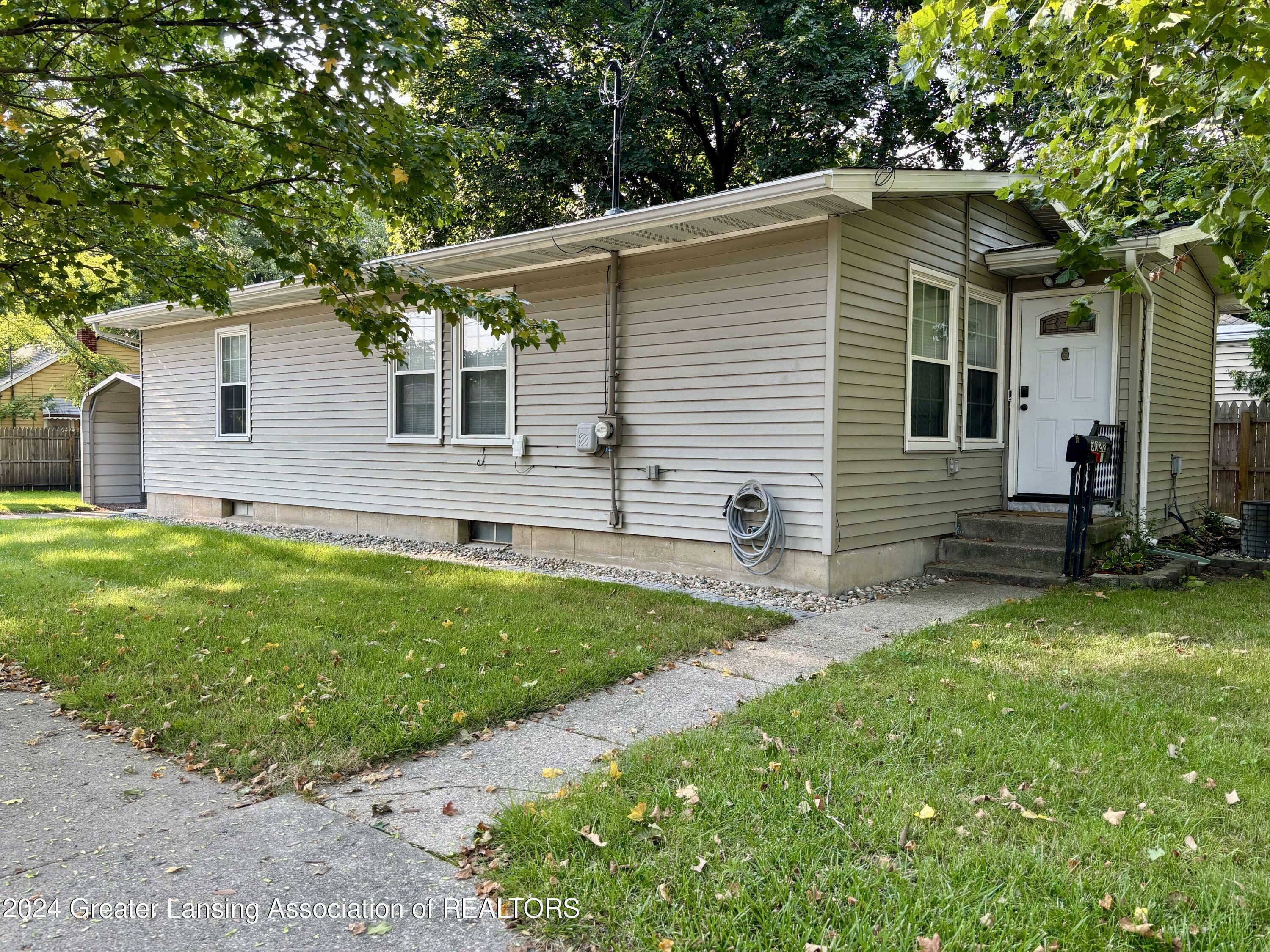 Property Photo:  3022 Stabler Street  MI 48910 