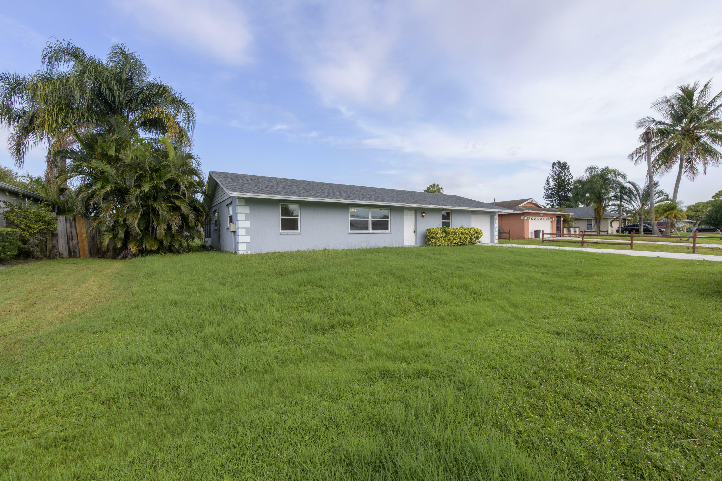 Property Photo:  2458 SW Hinchman Street  FL 34984 