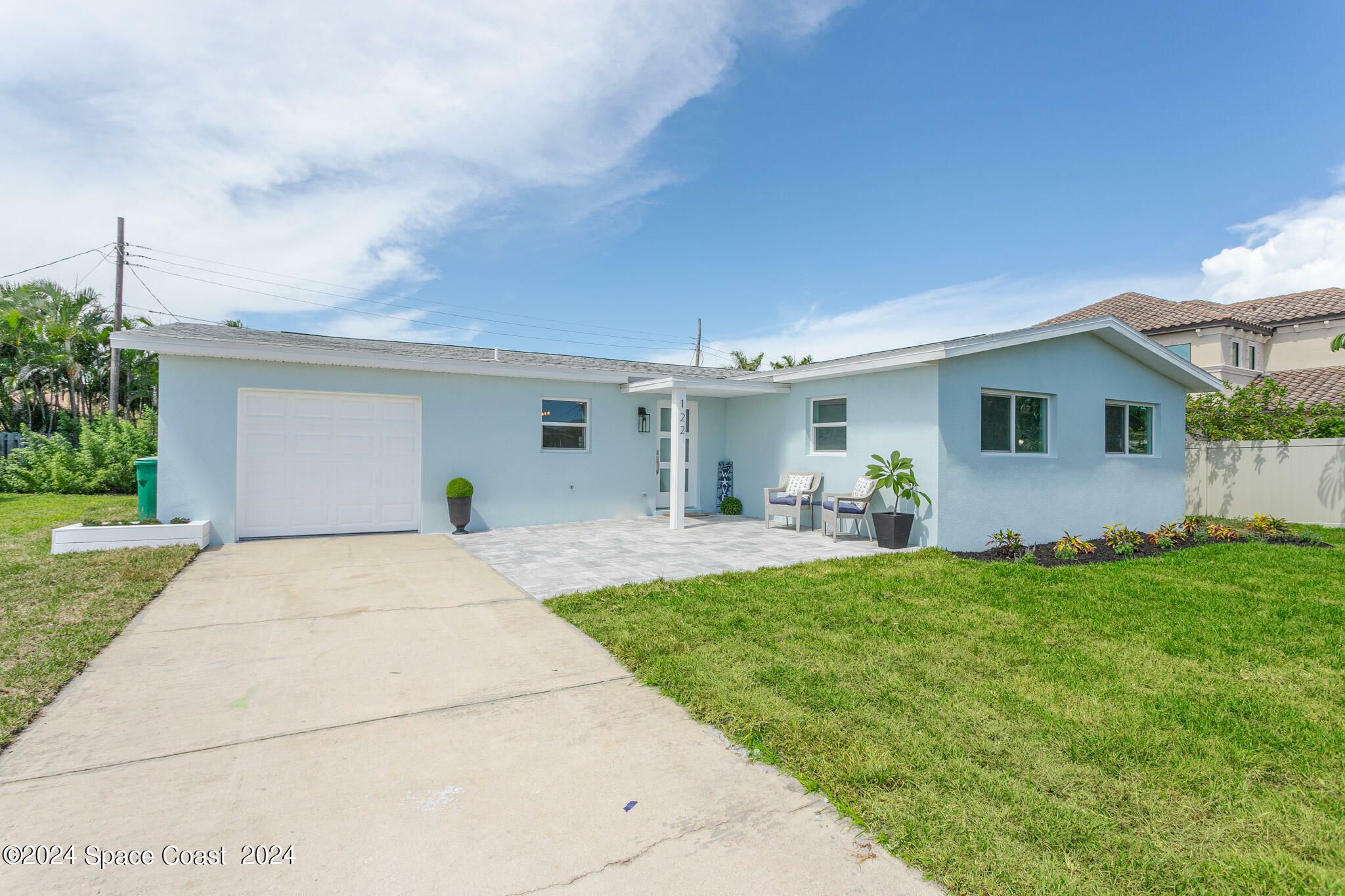 Property Photo:  122 Poinsetta Street  FL 32903 