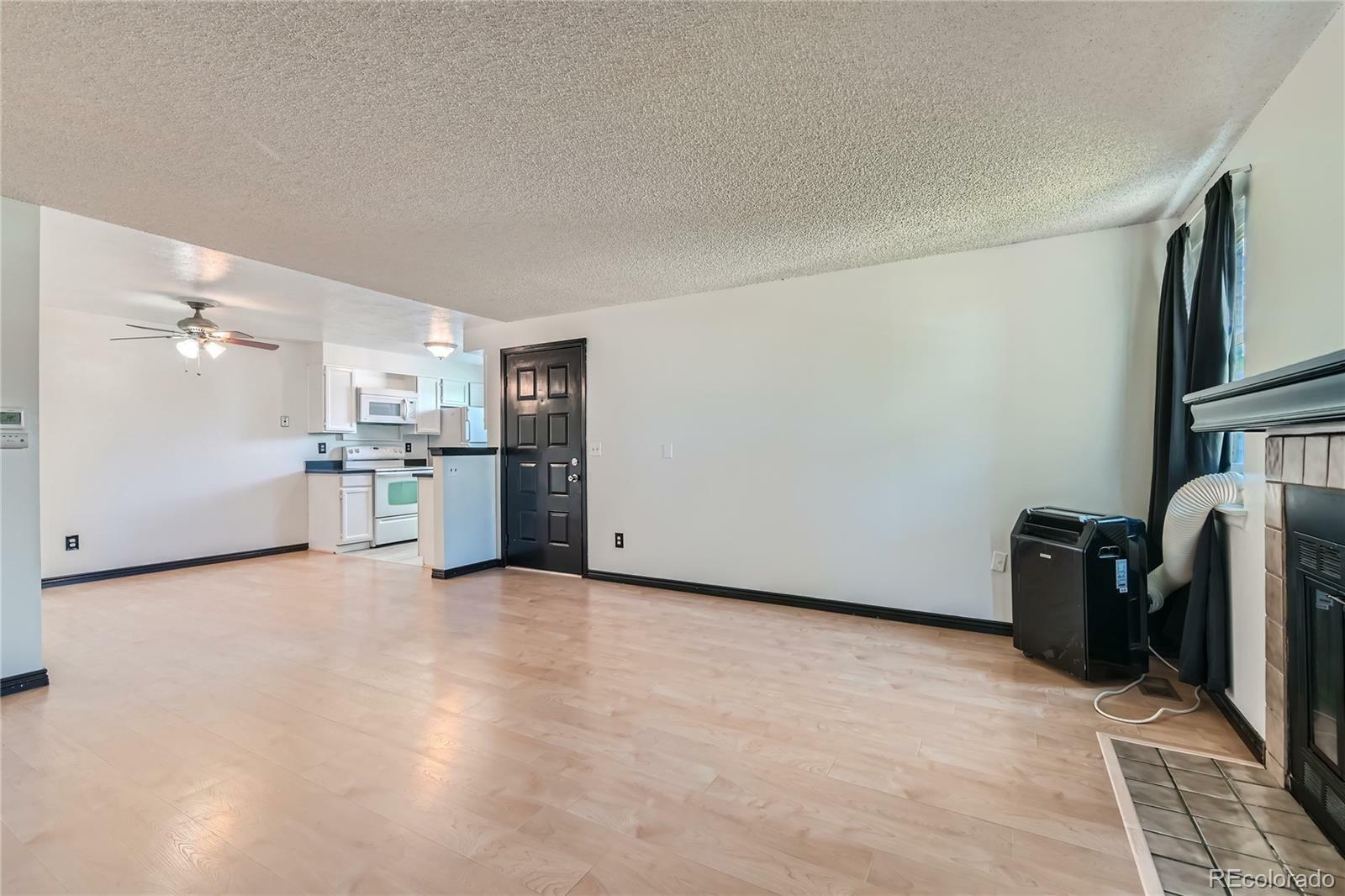 Property Photo:  11962 Bellaire Street C  CO 80233 